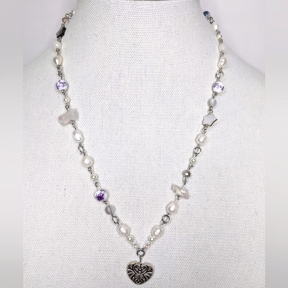 Necklace with a heart pendant and pearls. Handmade by me.